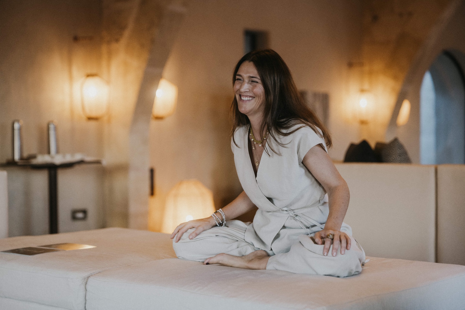 Portrait of Gabrielle smiling inside the retreat house