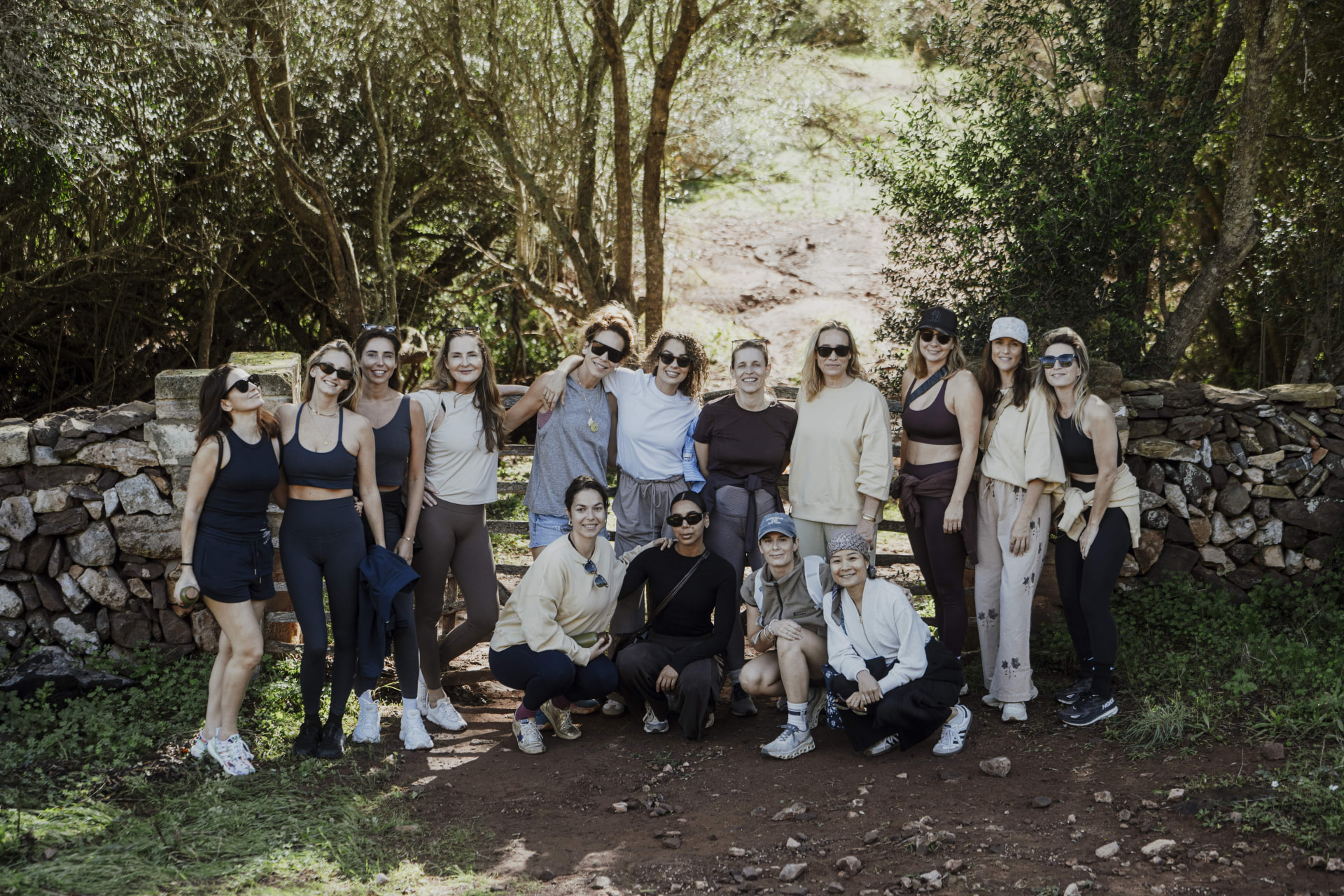 Retreat group gathered on a hike at a Kaer retreat